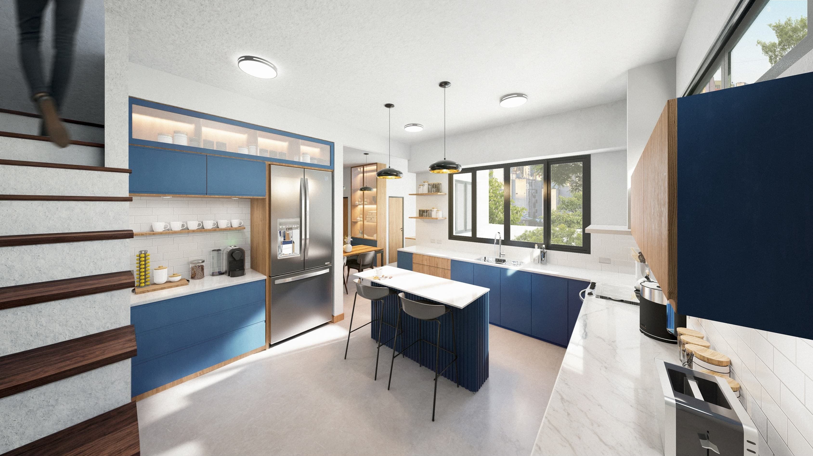 Cocina del anteproyecto Pujol con muebles azules y isla de mármol